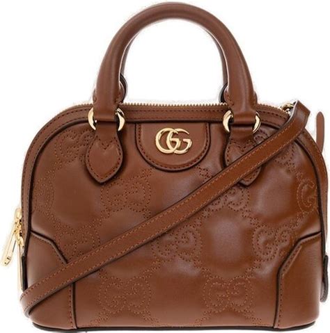 gucci gg logo plaque quilted shoulder bag|gucci interlocking bag.